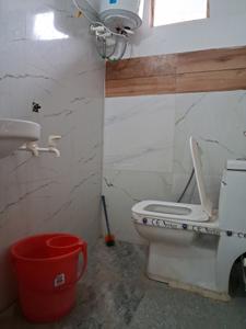 Common Bathroom Image of 180 Sq.ft 1 RK Independent House for rent in Sector 134 Noida for Rs. 10500