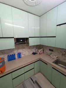 Kitchen Image of 950 Sq.ft 2 BHK Builder Floor for rent in Ramesh Nagar New Delhi for Rs. 28000