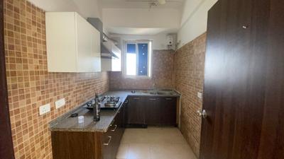 Kitchen Image of 1615 Sq.ft 3 BHK Apartment / Flat for sale in Umang Winter Hills, Sector 77 Gurgaon for Rs. 17500000