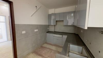 Kitchen Image of 1050 Sq.ft 4 BHK Apartment / Flat for sale in Sector 5 Rohini New Delhi for Rs. 10000000