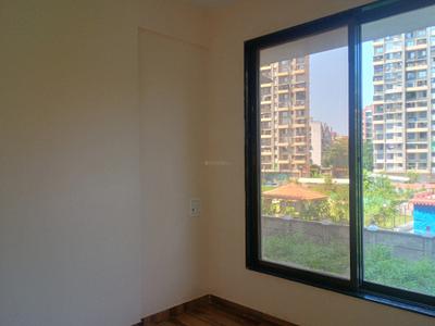 Bedroom Image of 616 Sq.ft 1 BHK Apartment / Flat for sale in Kulswamini Brahmand Wing B Janai Shankar, Thakurli Thane for Rs. 4420000