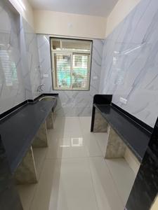Kitchen Image of 960 Sq.ft 2 BHK Apartment / Flat for sale in Mohan Willows III, Badlapur East Badlapur for Rs. 3955000