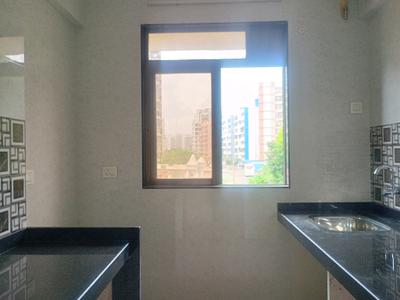 Kitchen Image of 725 Sq.ft 1 BHK Apartment / Flat for sale in Krishna Ultima, Kalyan East Kalyan for Rs. 4500000