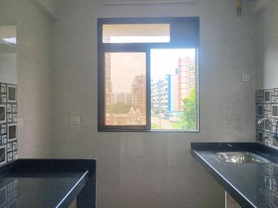 Kitchen Image of 730 Sq.ft 1 BHK Apartment / Flat for sale in Nisarg Greens, Ambernath East Ambernath for Rs. 3899000
