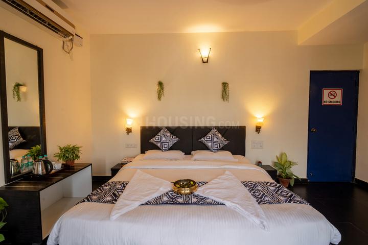 Bedroom Image of HelloWorld Riverbankinn in Morjim, Goa