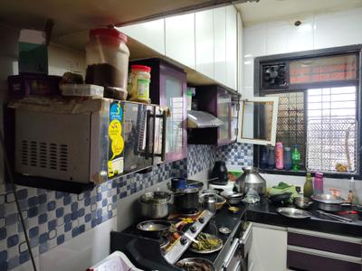 Kitchen Image of 530 Sq.ft 1 BHK Apartment / Flat for rent in Bhoomi Acres, Hiranandani Estate Thane for Rs. 18000