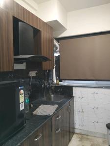 Kitchen Image of 370 Sq.ft 1 RK Apartment / Flat for sale in DLF Capital Greens, Karampura New Delhi for Rs. 4100000