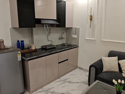 Kitchen Image of 900 Sq.ft 1 BHK Builder Floor for rent in Sector 31 Gurgaon for Rs. 32000