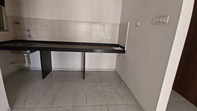 Kitchen Image of 870 Sq.ft 2 BHK Apartment / Flat for sale in Wagholi Pune for Rs. 5100000