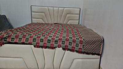 Bedroom Image of Kuljeet pg in Janakpuri, New Delhi