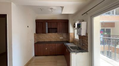 Kitchen Image of 990 Sq.ft 2.5 BHK Apartment / Flat for sale in NBCC Tropical Garden, Noida Extension Greater Noida for Rs. 7635000