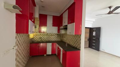 Kitchen Image of 1060 Sq.ft 2 BHK Apartment / Flat for sale in Gaur City 2 16th Avenue, Noida Extension Greater Noida for Rs. 8900000