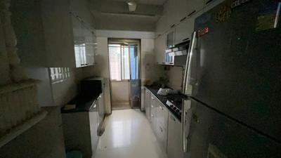 Kitchen Image of 900 Sq.ft 2 BHK Apartment / Flat for sale in Ekta Meadows, Borivali East Mumbai for Rs. 25000000