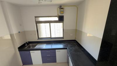 Kitchen Image of 720 Sq.ft 1 BHK Apartment / Flat for rent in Lodha Splendora, Thane West Thane for Rs. 20000