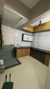 Kitchen Image of 600 Sq.ft 1 BHK Apartment / Flat for rent in Savvy Studioz, Gota Ahmedabad for Rs. 23000