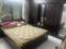 Karnavati Apartment Bedroom 1