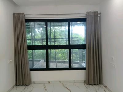 Living Room Image of 900 Sq.ft 2 BHK Apartment / Flat for sale in Unique Poonam Estate Cluster II Building No 4 5 6, Mira Road East Mira Bhayandar for Rs. 12500000