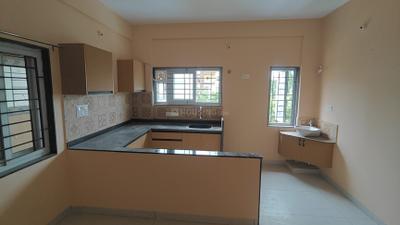 Kitchen Image of 710 Sq.ft 1 BHK Apartment / Flat for rent in Thanisandra Bengaluru for Rs. 20000