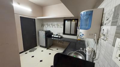 Kitchen Image of 1100 Sq.ft 2 BHK Builder Floor for rent in Sayajipura Vadodara for Rs. 18500