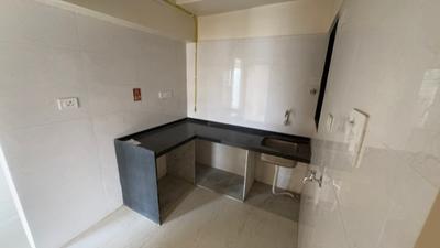 Kitchen Image of 650 Sq.ft 2 BHK Apartment / Flat for sale in ARC Aura, Andheri West Mumbai for Rs. 20000000