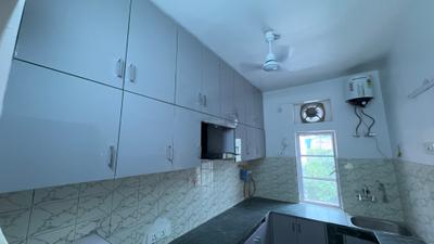 Kitchen Image of 1200 Sq.ft 2 BHK Builder Floor for rent in Janakpuri New Delhi for Rs. 37000