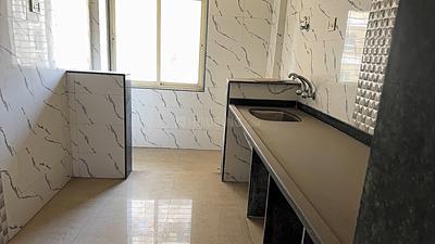 Kitchen Image of 715 Sq.ft 1 BHK Apartment / Flat for sale in Mohan Highlands, Badlapur East Badlapur for Rs. 3000000