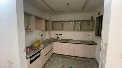 Kitchen Image of 1215 Sq.ft 3 BHK Apartment / Flat for sale in Rajpur Khurd Extension New Delhi for Rs. 8500000