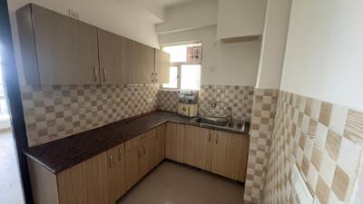 Kitchen Image of 890 Sq.ft 2 BHK Apartment / Flat for sale in Gaurs 16th Avenue, Noida Extension Greater Noida for Rs. 7900000