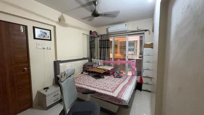 Bedroom Image of 615 Sq.ft 1 BHK Apartment / Flat for sale in Thakurli Thane for Rs. 4700000