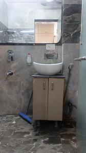 Bathroom Image of 357 Sq.ft 1 BHK Studio for rent in DLF Capital Greens Phase 1 And 2, Karampura New Delhi for Rs. 26000