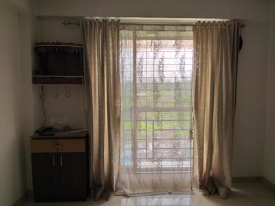 Bedroom Image of 675 Sq.ft 1 BHK Apartment / Flat for sale in Unique Nirmal Nagari, Diva Thane for Rs. 4500000