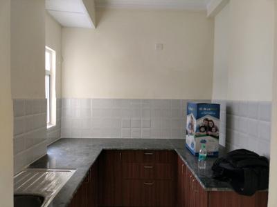 Kitchen Image of 1000 Sq.ft 2 BHK Apartment / Flat for sale in Amrapali Verona Heights, Noida Extension Greater Noida for Rs. 7300000
