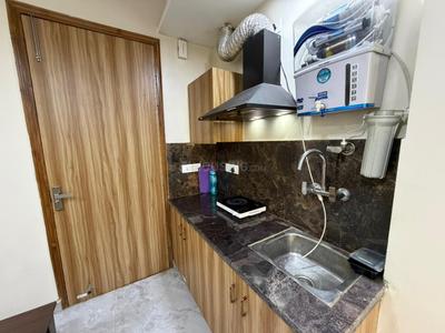 Kitchen Image of 936 Sq.ft 1 BHK Builder Floor for rent in Sector 27 Gurgaon for Rs. 30000