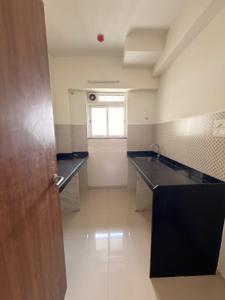 Kitchen Image of 600 Sq.ft 1 BHK Apartment / Flat for rent in Lodha Amara, Kolshet Thane for Rs. 28000