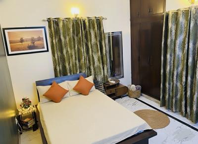 Bedroom Image of 1000 Sq.ft 3 BHK Independent House for rent in Sector 19 Noida for Rs. 40000