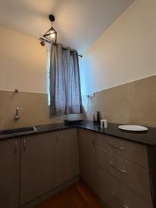 Kitchen Image of 600 Sq.ft 1 RK Apartment / Flat for rent in Thanisandra Bengaluru for Rs. 20000