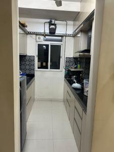 Kitchen Image of 650 Sq.ft 1 BHK Apartment / Flat for sale in Lodha Amara, Kolshet Thane for Rs. 7500000
