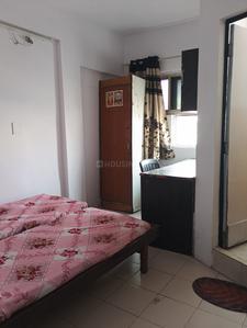 Bedroom Image of Tulja PG Room in Thaltej, Ahmedabad