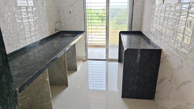Kitchen Image of 1050 Sq.ft 2 BHK Apartment / Flat for rent in Neelkanth Exotica, Dronagiri Navi Mumbai for Rs. 14000