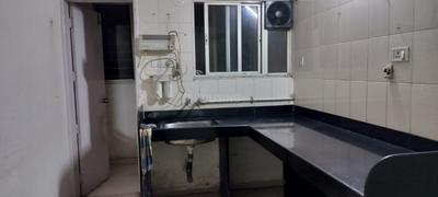 Kitchen Image of 1100 Sq.ft 2 BHK Apartment / Flat for rent in Vishrantwadi Pune for Rs. 30000