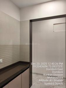 Kitchen Image of 695 Sq.ft 2 BHK Apartment / Flat for sale in Nirman Milan Dham, Dombivli East Thane for Rs. 6000000