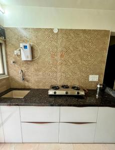 Kitchen Image of 1087 Sq.ft 2 BHK Apartment / Flat for rent in Samraat AmOzon, Gangapur Nashik for Rs. 26000