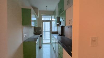 Kitchen Image of 1235 Sq.ft 2.5 BHK Apartment / Flat for rent in Mahagun Mascot, Crossings Republik Ghaziabad for Rs. 23000