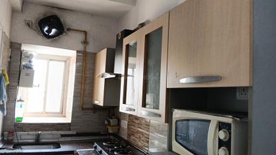 Kitchen Image of 935 Sq.ft 2 BHK Apartment / Flat for rent in CGHS Rail Vihar, Sector 15 Gurgaon for Rs. 35000