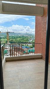 Balcony Image of 1150 Sq.ft 3 BHK Apartment / Flat for rent in Shapoorji Pallonji Joyville Sensorium, Maan Pune for Rs. 32000