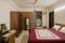 Gulmohar Apartment Bedroom 1