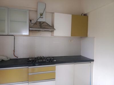 Kitchen Image of 650 Sq.ft 1 BHK Apartment / Flat for rent in Ajax Global Lifestyle Kharadi, Kharadi Pune for Rs. 32000