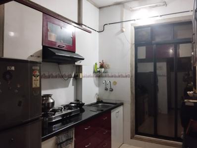 Kitchen Image of 950 Sq.ft 2 BHK Apartment / Flat for sale in Thakurli Thane for Rs. 7200000