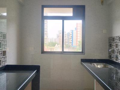 Kitchen Image of 700 Sq.ft 1 BHK Apartment / Flat for sale in Mohan Nano Estates, Ambernath West Ambernath for Rs. 2600000