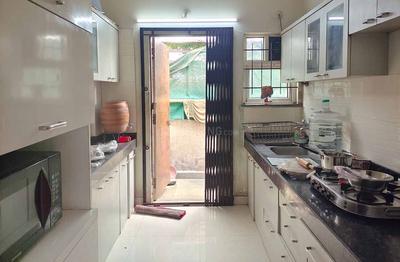 Kitchen Image of Chrrysalis Apartment - Wagholi in Wagholi, Pune